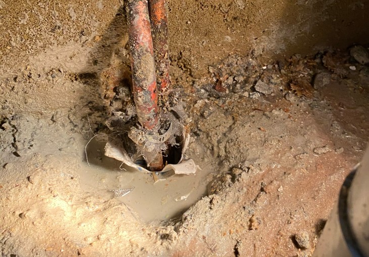 Maintenance work. JMT Plumbing fixes the hidden leak, saving the customer from expensive damages.