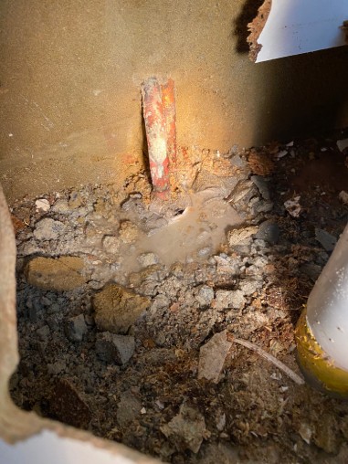 Maintenance work. JMT Plumbing finds the source of a hidden leak.